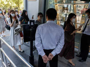 Some Beijing travelers asked to wear COVID monitoring bracelets, sparking outcry