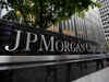 JPMorgan suspends buybacks, warns on global economy as profit slumps