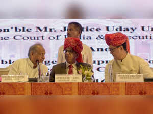 Jaipur : Chief Justice of India NV Ramana, Rajasthan Chief Minister Ashok Gehlot and Union Law and Justice Minister Kiren Rijiju during the 18th All India Legal Services Authorities Meet, organised by National Legal Services Authority (NALSA) in Jaipur on Saturday, July 16, 2022. (Photo:Ravi shankar vyas/IANS)
