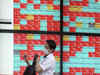 Asian shares inch higher, tense week ahead for EU