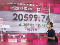 Asian shares drift lower in choppy markets