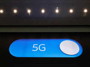 An advertising board shows a 5G logo at the International Airport in Zaventem