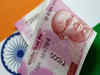Rupee wedged in a tight band; RBI intervention in focus