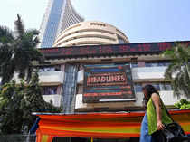Sensex, Nifty open flat amid weak global cues; IndusInd Bank rises 3% after Q1 results