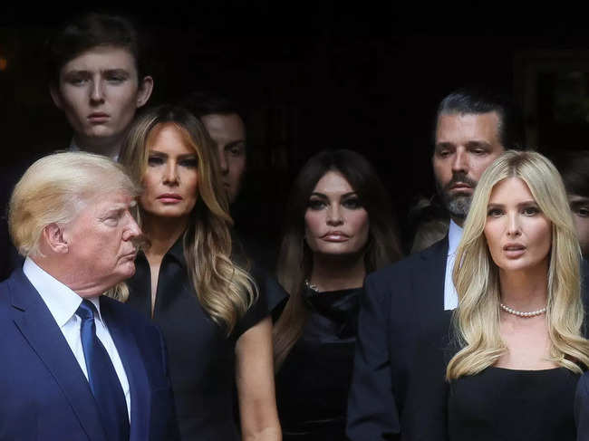 Former U.S. President Donald Trump, his wife Melania, Kimberly Guilfoyle, his sons Barron and Donald Jr. and his daughter Ivanka leave St. Vincent Ferrer Church during the funeral of Ivana Trump