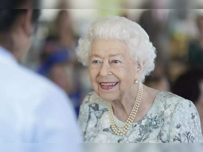 File photo of July 15, 2022​: Queen Elizabeth II looks on during a visit to officially open the new building at Thames Hospice, Maidenhead, Berkshire.