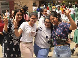 New Delhi: Students celebrate after the CBSE Class 12th result at St. Thomas School in New Delhi on Friday, July 22, 2022. (Photo: Anupam Gautam/IANS)
