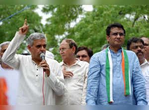 Delhi Congress President Anil Chaudhary with party lead...