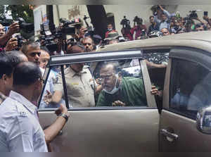 West Bengal Minister Partha Chatterjee being produced at a court after he was arrested by Enforcement Directorate (ED) officials.