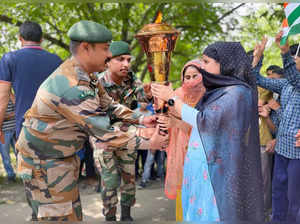 Srinagar, Jul 06 (ANI): Kargil Vijay Diwas Victory Flame arrived at Chak- Kigam ...