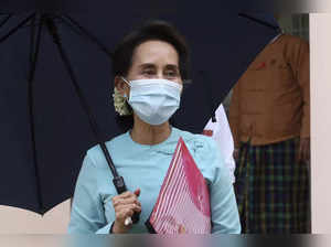 FILE - Myanmar Leader Aung San Suu Kyi leaves after the Central Executive Commit...