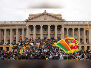 Demonstrators protest at the Presidential Secretariat, after President Gotabaya Rajapaksa fled, in Colombo