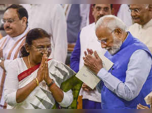 New Delhi: President Droupadi Murmu with Prime Minister Narendra Modi during her...