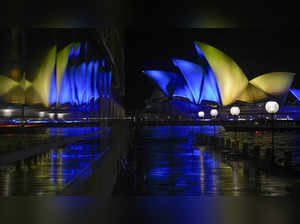 Sydney:  The sails of the Opera House are illuminated with the colors of Ukraine...