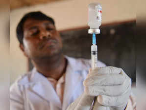 Agartala: A health worker fills a syringe with a COVID-19 vaccine at a School in Agartala on Tuesday July 05,2022.(Photo:Abhishek Saha/IANS)