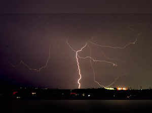 Bhopal: Streaks of lightning during a light thunderstorm in Bhopal. (PTI Photo)(...