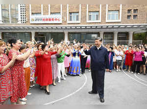 China's Xi, in Xinjiang, signals no change to Uyghur policy
