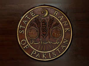 FILE PHOTO: Logo of the State Bank of Pakistan (SBP) is pictured on a reception desk at the head office in Karachi