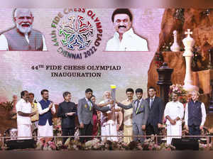 Chennai:  Prime Minister Narendra Modi holds the Chess Olympiad torch at the Ope...