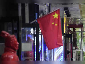 China backs away from growth goal, sticks to virus controls