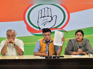 New Delhi: Senior Congress leader Jairam Ramesh with party leader Pawan Khera an...