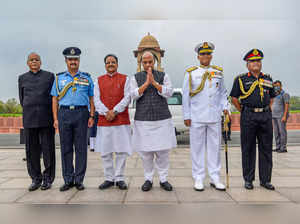 New Delhi: Union Defence Minister Rajnath Singh with MoS Ajay Bhatt, Army Chief ...