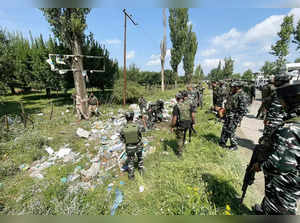 Baramulla, June 11 (ANI): Security personnel deployed at Srinagar-Baramulla Nati...