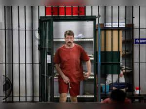 Suspected Russian arms dealer Viktor Bout arrives at a courthouse in Bangkok