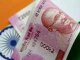 Rupee flat at open as dollar climbs