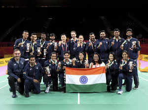 Team India celebrate winning the silver medal in Badminton Team event