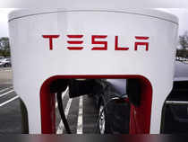 Tesla investors approve stock split; Musk to add factories