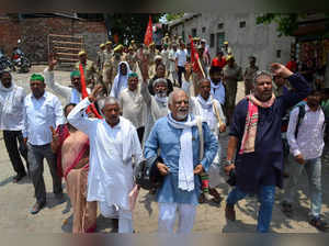 Varanasi: Members of Samyukta Kisan Morcha protest against Centre's 'Agnipath' s...