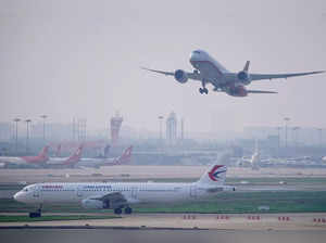 FILE PHOTO: A China Eastern Airlines aircraft and  Shanghai Airlines aircraft are seen in Hongqiao International Airport in Shanghai