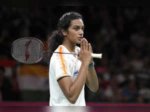 Venkata Sindhu Pusarla of India reacts after winning match point against Jia Min...