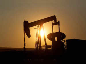 oil pump jack pumps oil in a field