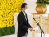 Japan PM promises to never again wage war, ministers visit controversial shrine