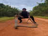 Man comes dangerously close to be attacked by a king cobra