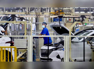 Chennai: Workers busy in the Assembly Line at Hyundai' Sriperumbudur facility, n...