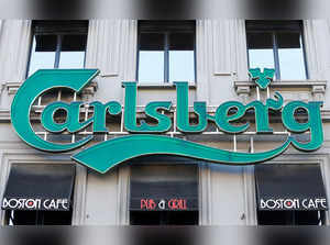FILE PHOTO: FILE PHOTO: A logo of Carlsberg beer is seen on the entrance of a pub in Brussels