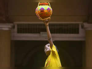 Mumbai: A student of Kamala Mehta School for Blind breaks the 'dahi handi' durin...