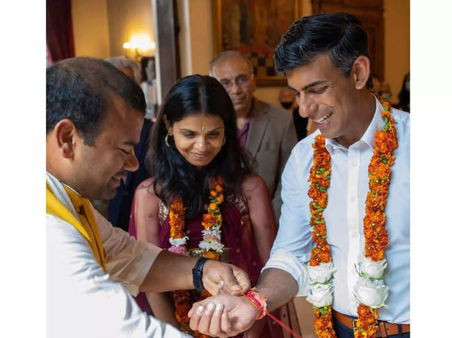 ​Rishi Sunak was accompanied by his wife Akshata Murty, at Bhaktivedanta Manor in Watford, Hertfordshire.​