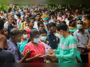 Chennai: Parents and students outside an NEET UG examination centre, in Chennai....