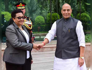 New Delhi: Defence Minister Rajnath Singh shakes hands with his Tanzanian counte...