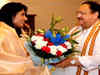 Hyderabad: BJP president JP Nadda interacts with former cricketer Mithali Raj during Telangana visit