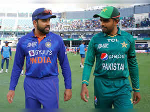 Dubai, Aug 28 (ANI): India's Rohit Sharma with Pakistan's Babar Azam during the ...