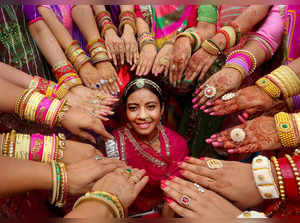 Bhopal: Members of Kesariya Rajput Women Group celebrate 'Hariyali Teej' festiva...