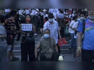 China bank customers to get deposits back after protests