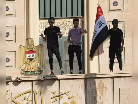 Protestors raising