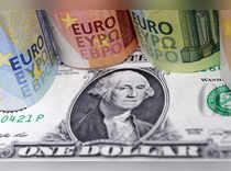 FOREX-Hike bets hoist euro and bolster U.S. dollar