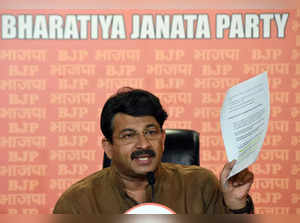 New Delhi, Aug 30 (ANI): BJP MP Manoj Tiwari addresses a press conference allegi...